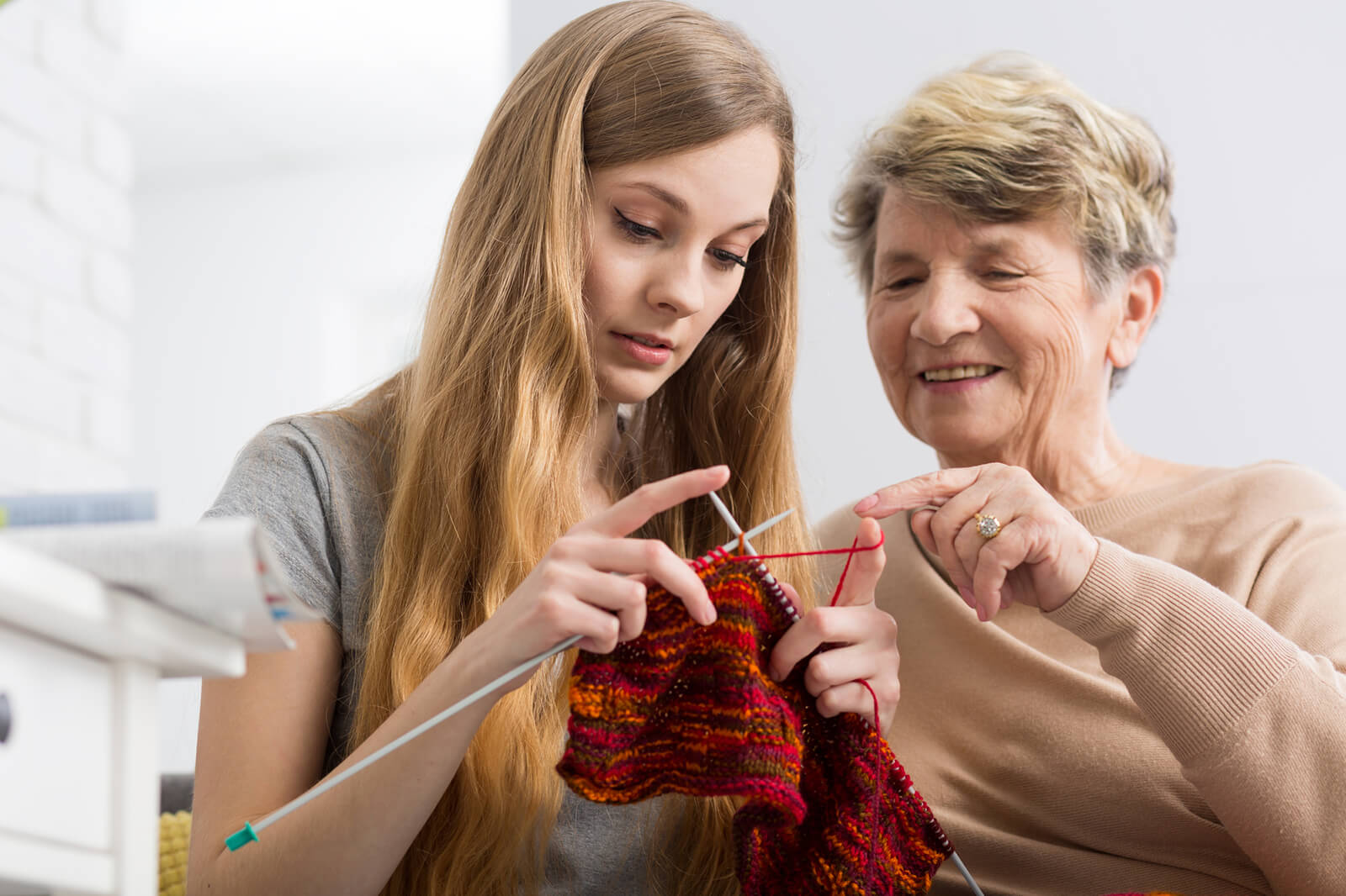 Luluz Healthcare caregiver sharing an activity with a service user