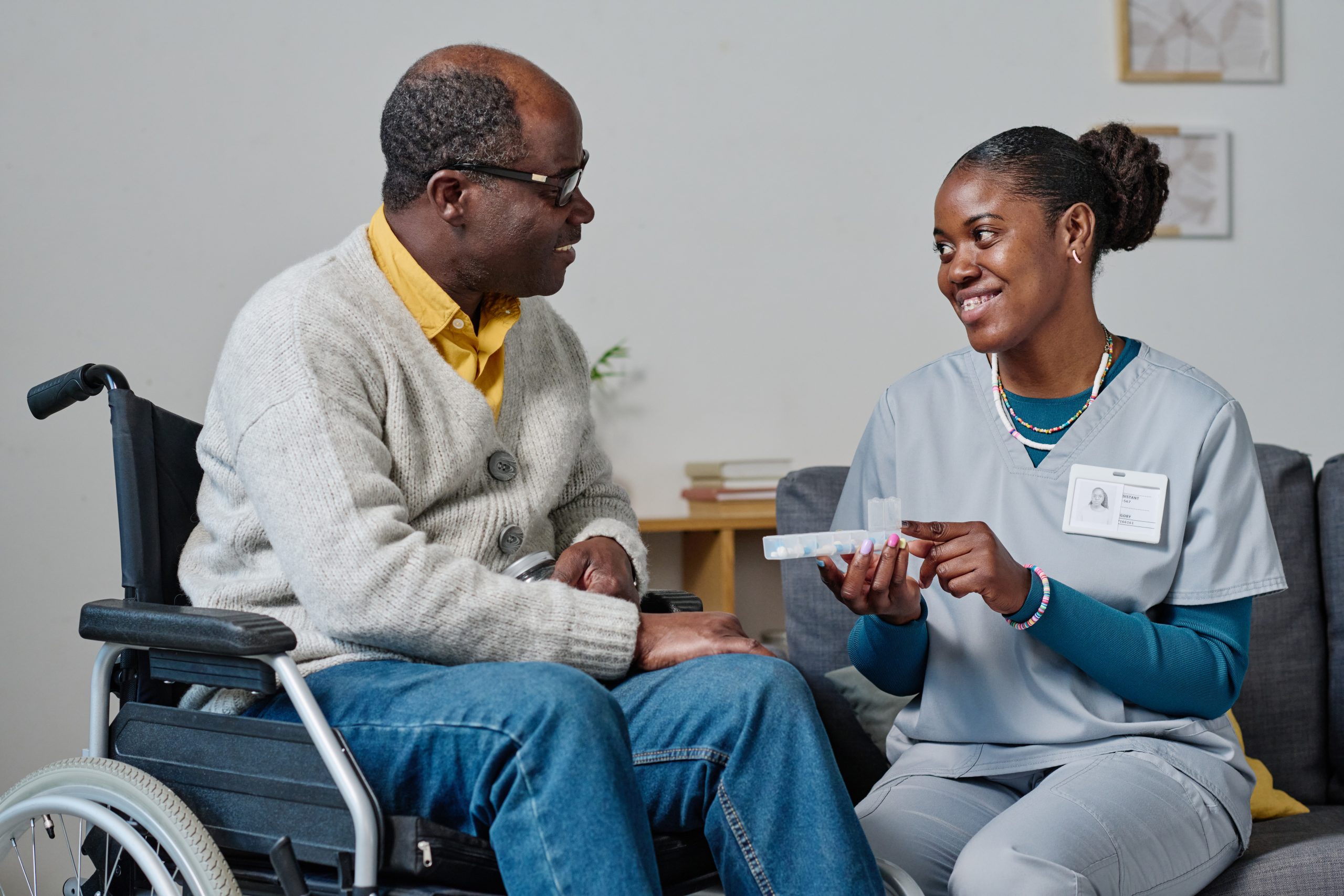 Luluz Healthcare caregiver supporting a service user at home